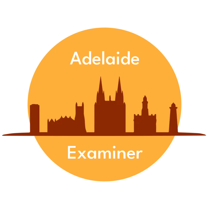 Adelaide Examiner logo showing a collection of buildings on a yellow circle.
